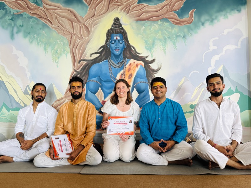 Yoga students practicing outdoor asanas at Rudra Yogpeeth Rishikesh